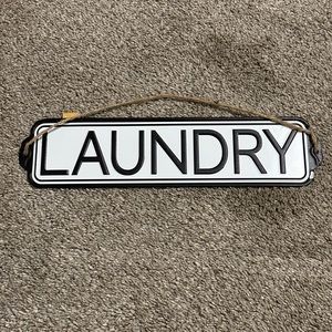 Metal laundry sign
